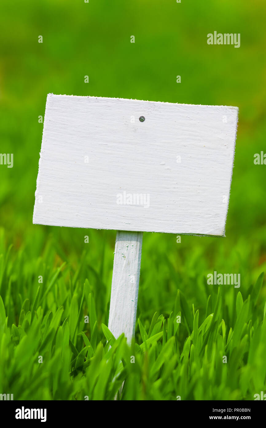 empty sign on green grass Stock Photo