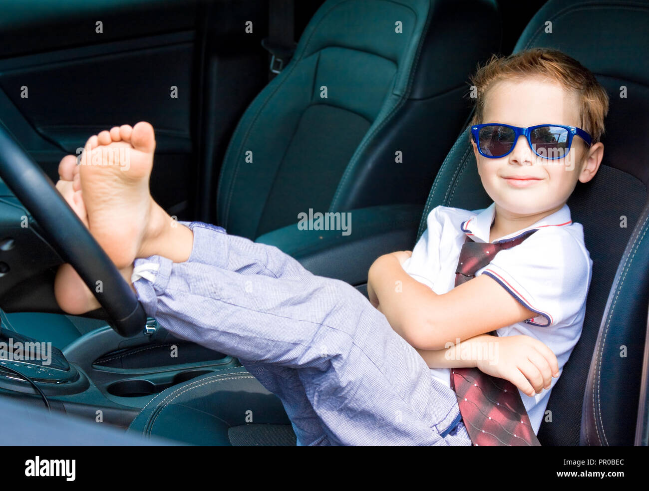 Cute driver in car Stock Photo