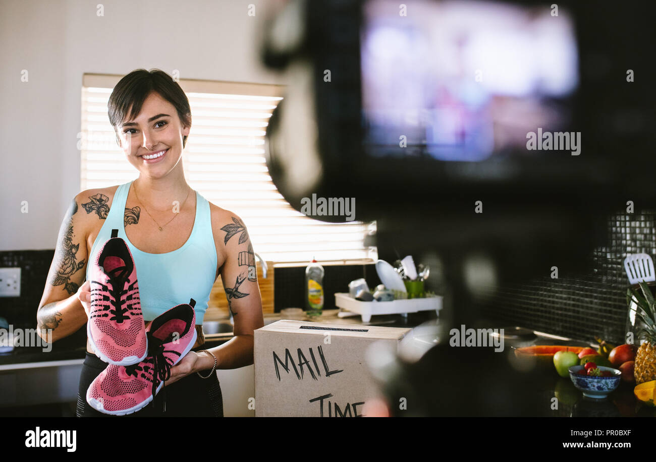 Woman showing on shoe hi-res stock photography and images - Alamy