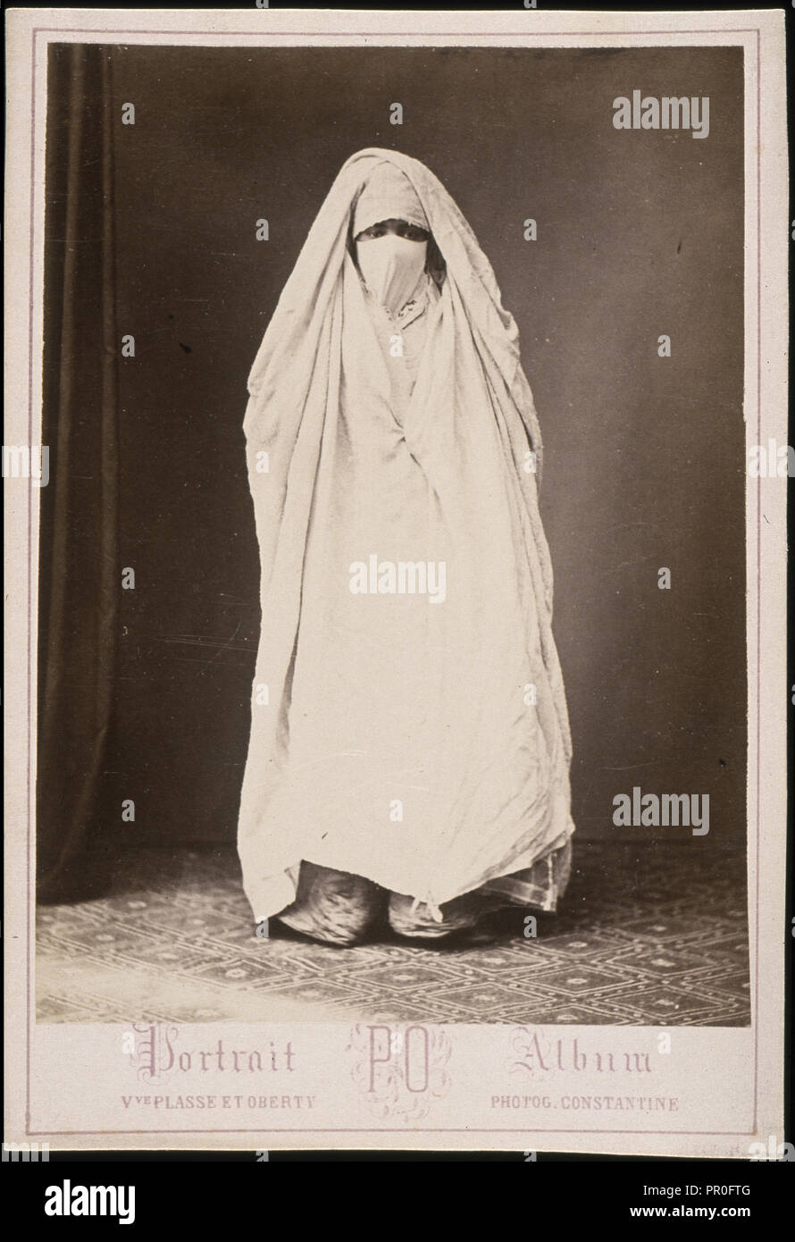 Veiled woman, standing, Cities and sites cabinet card collection, Veuve Plasse et Oberty, Albumen, after 1867, Portrait Album Stock Photo