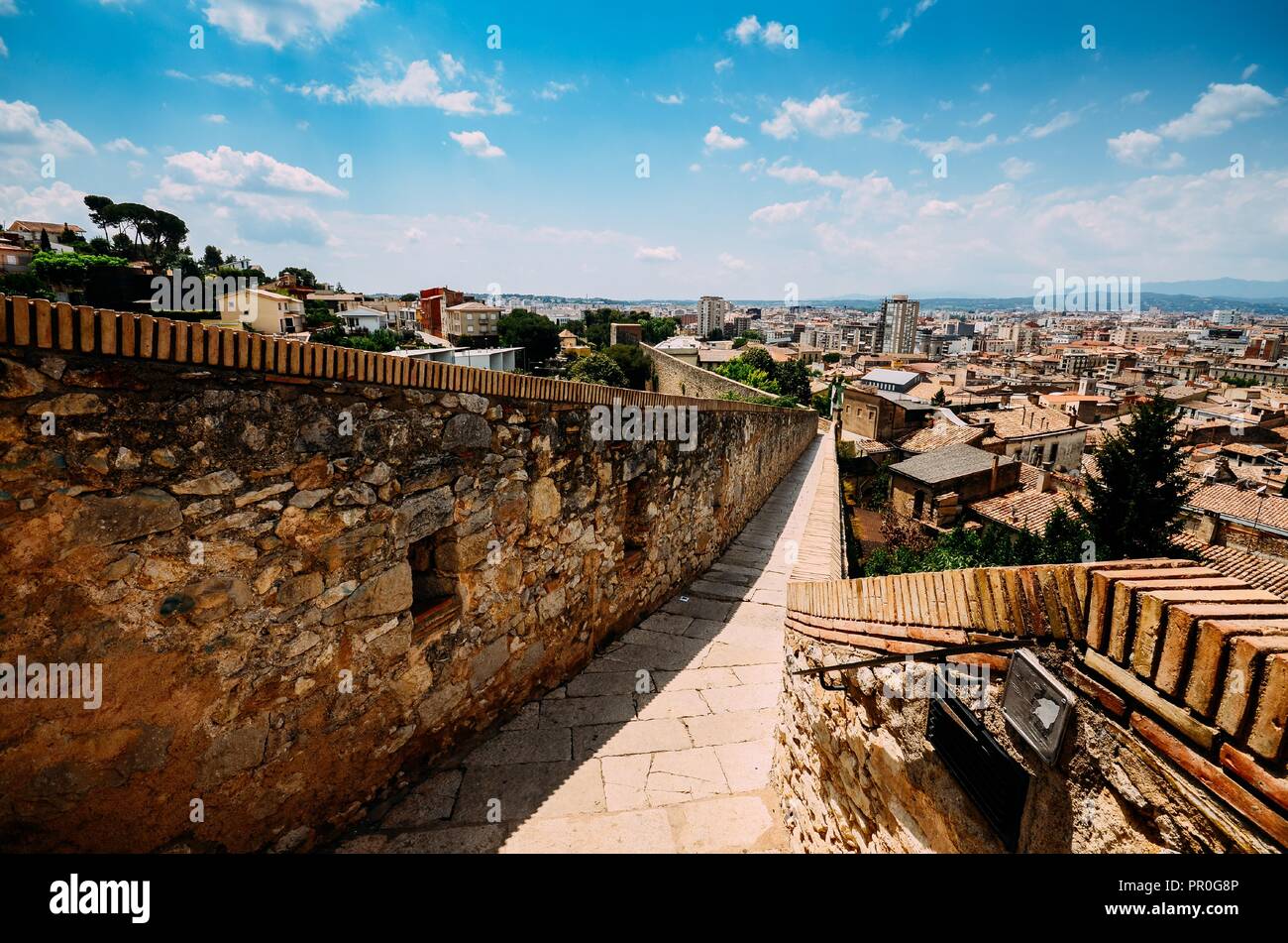 Venerable 9th century city walls with walkways, towers and scenic vantage points of Girona, Catalonia, Spain, Europe Stock Photo