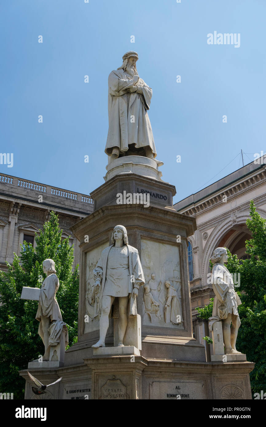 Leonardo da Vinci statue with his disciples at his feet in Piazza della Scala, Milan, Lombardy, Italy, Europe Stock Photo