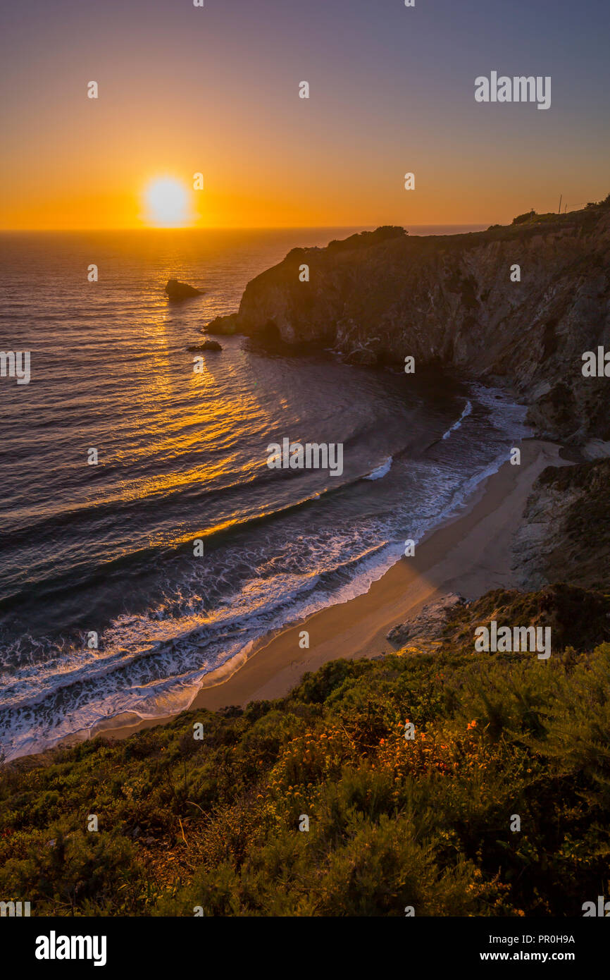 View of sunset at Big Sur, Highway 1, Pacific Coast Highway, Pacific Ocean, California, United States of America, North America Stock Photo