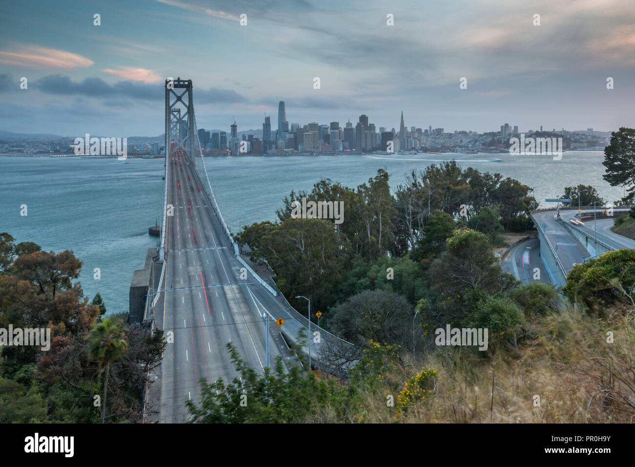 View of San Francisco skyline and Oakland Bay Bridge from Treasure Island at dusk, San Francisco, California, United States of America, North America Stock Photo