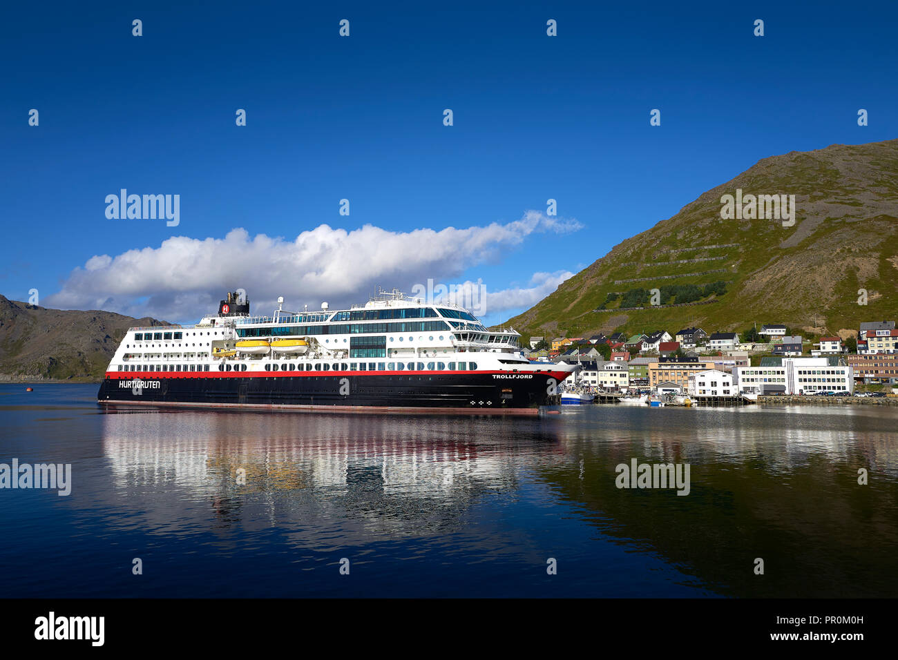 The Norwegian Hurtigruten Ship, MS TROLLFJORD, Moored In The Arctic Fishing Village Of Honningsvåg, Finnmark County, Norway. Stock Photo