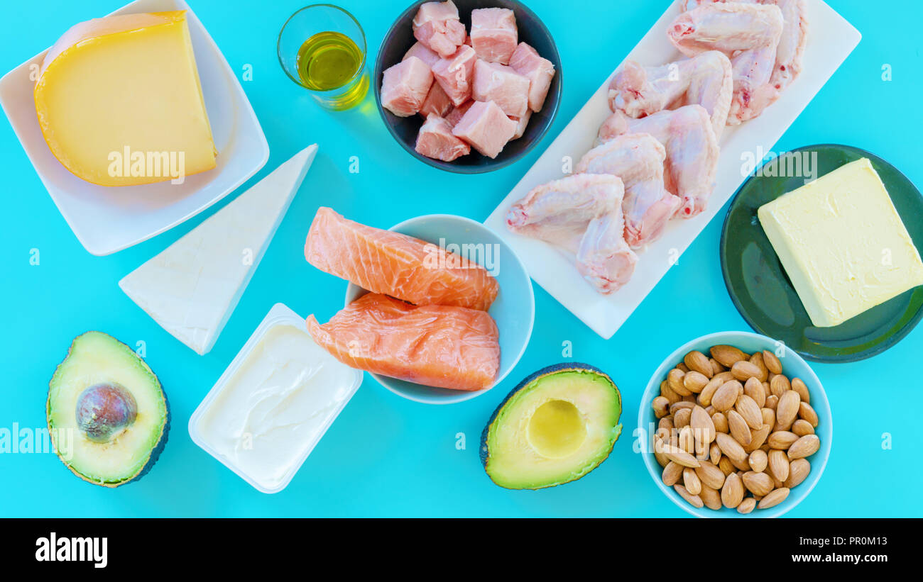 Ketogenic diet food. Lowcarb food background, fish, meat, cheese, nuts