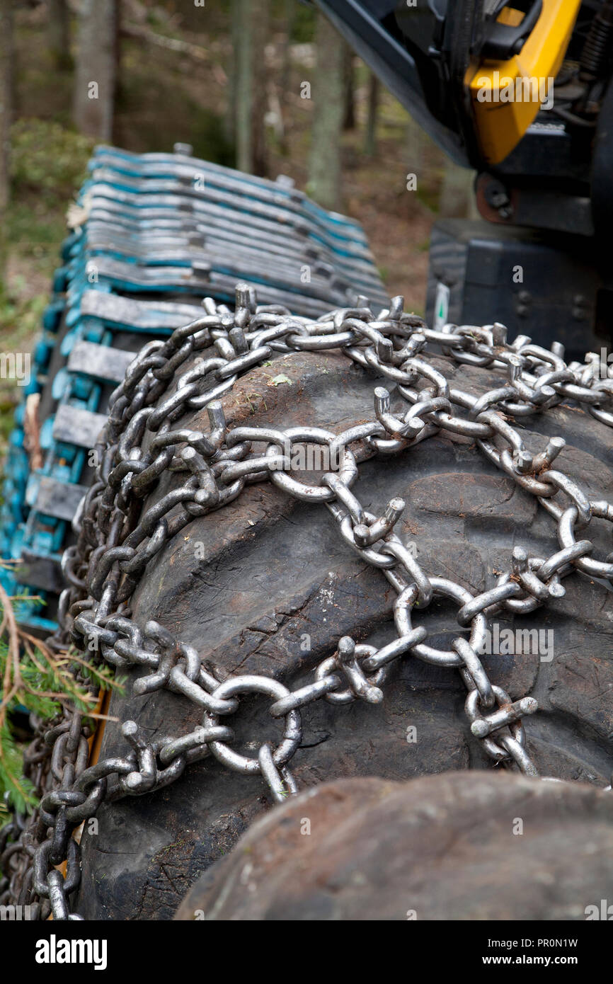 DECK with chains to a forest harvester Stock Photo