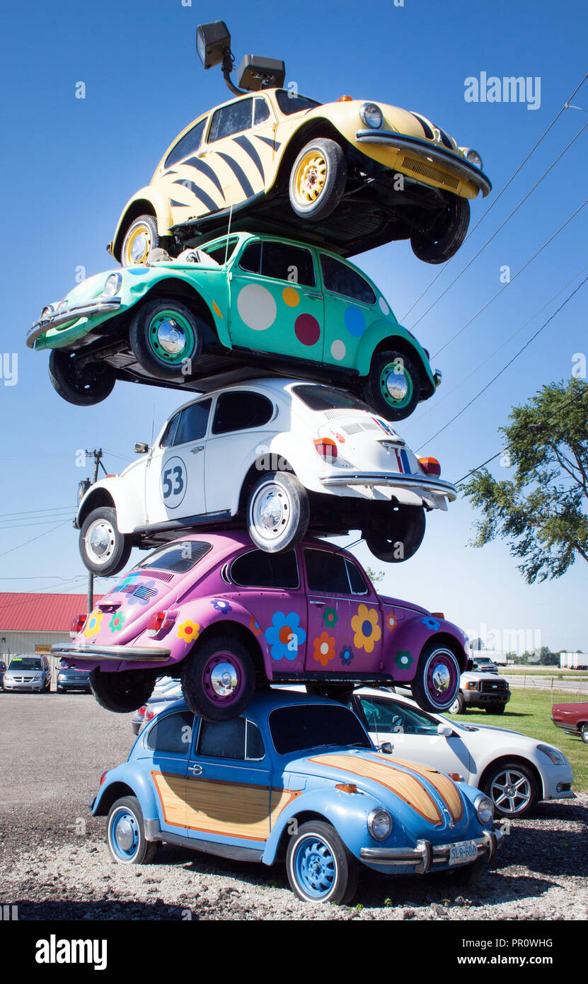 Stack of VW Bugs on a pole in Defiance, Ohio Stock Photo