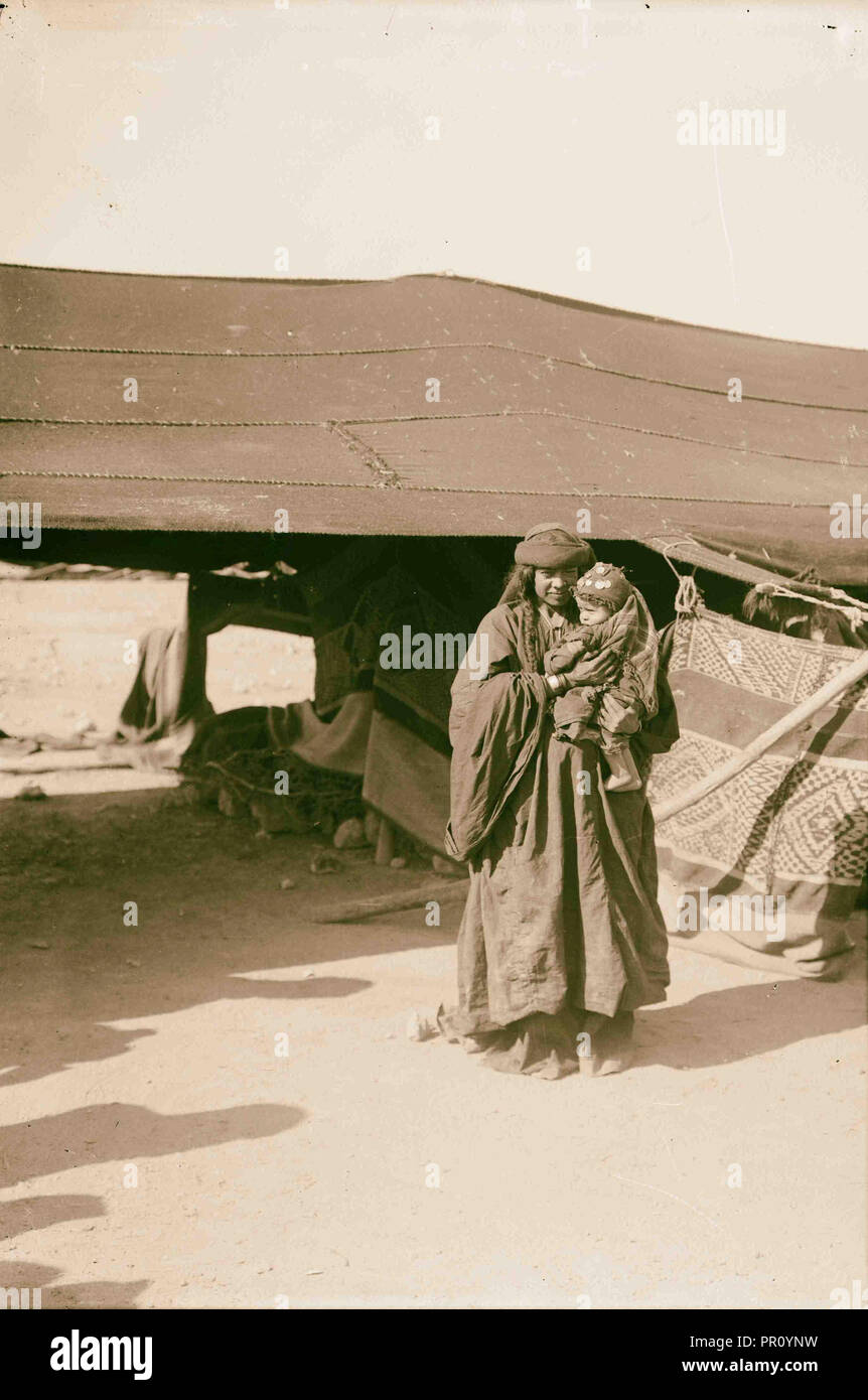 Bedouin wedding Bedouin mother and baby. 1900, the Bedouin are a grouping of nomadic Arab peoples Stock Photo
