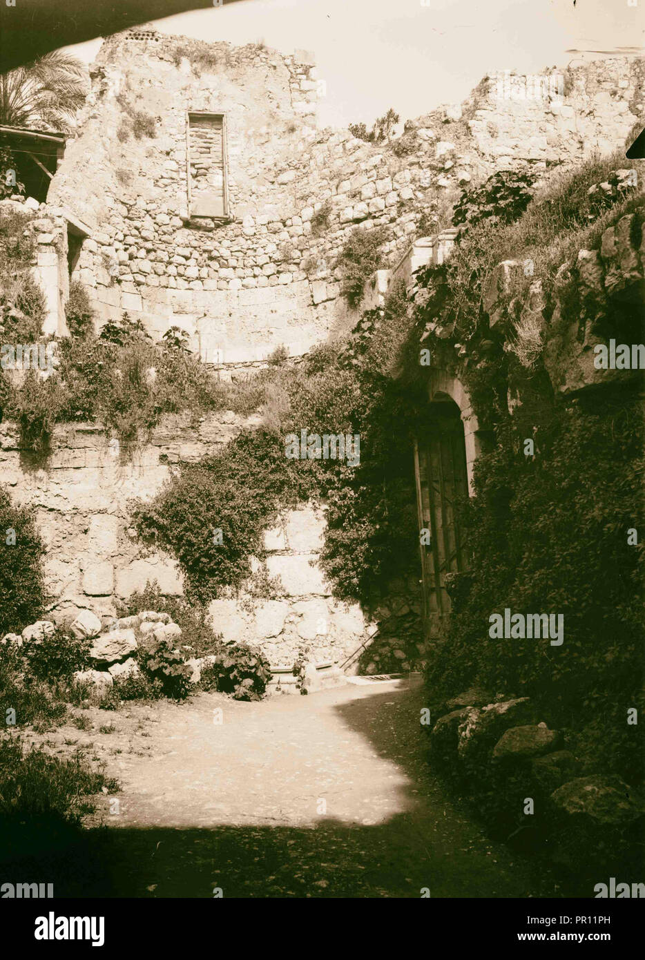 Via Dolorosa, beginning at St. Stephen's Gate. Remains of Crusader church. Photograph shows remains of a crusader chapel over Stock Photo