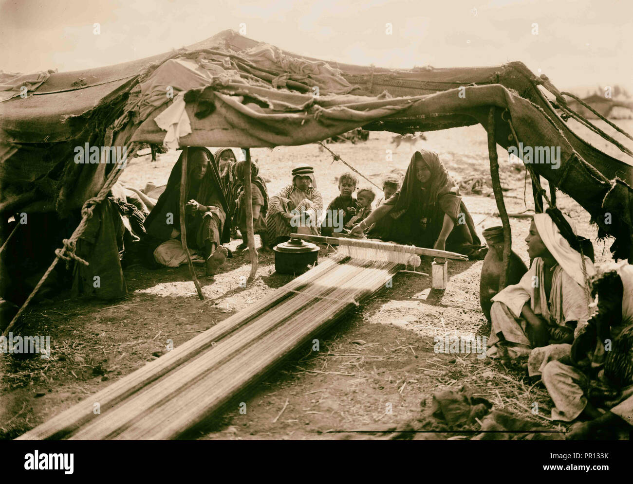 Bedouin woman weaving. 1898 Stock Photo