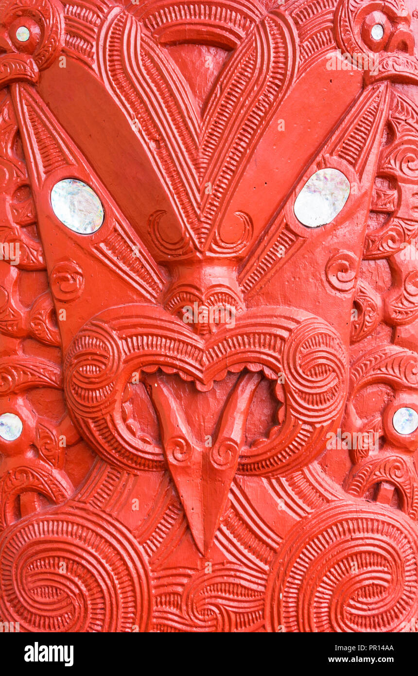 Red Maori carving, Marai meeting house, Whakarewarewa thermal village, Wahiao, Rotorua, North Island, New Zealand, Pacific Stock Photo