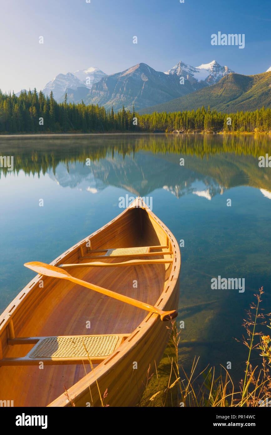 Canoe on Herbert Lake at sunrise, Banff National Park, UNESCO World Heritage Site, Alberta, Rocky Mountains, Canada, North America Stock Photo