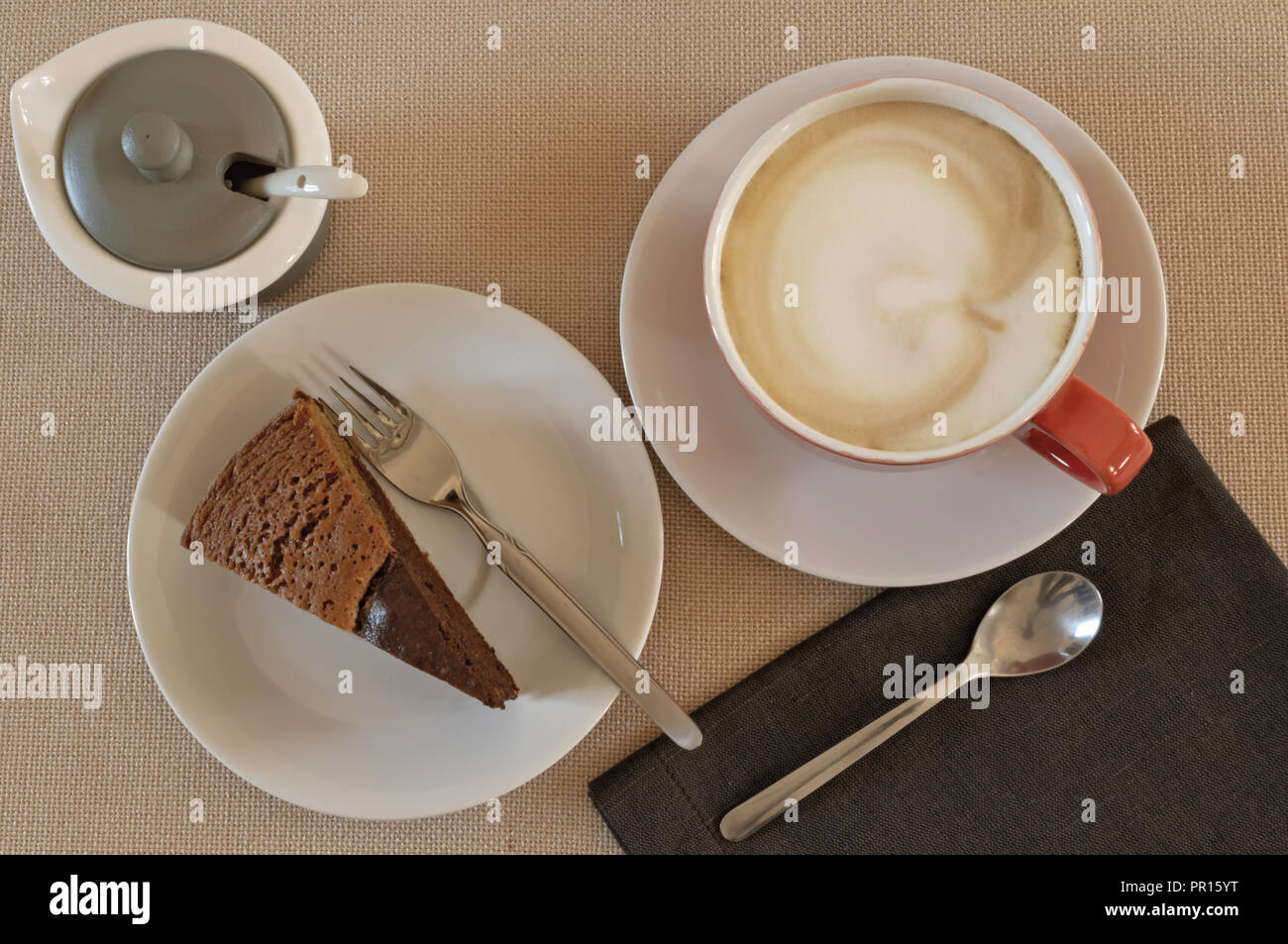 Italian breakfast with chocolate cake and coffee with cappuccino 2 Stock Photo