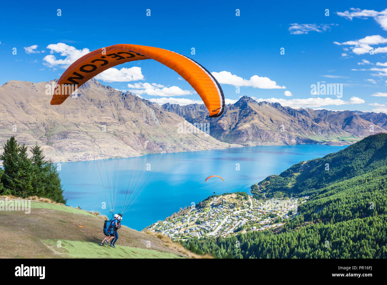 Tandem Paragliding, from Bob's Peak above Lake Wakatipu, Queenstown, Otago, South Island, New Zealand, Pacific Stock Photo