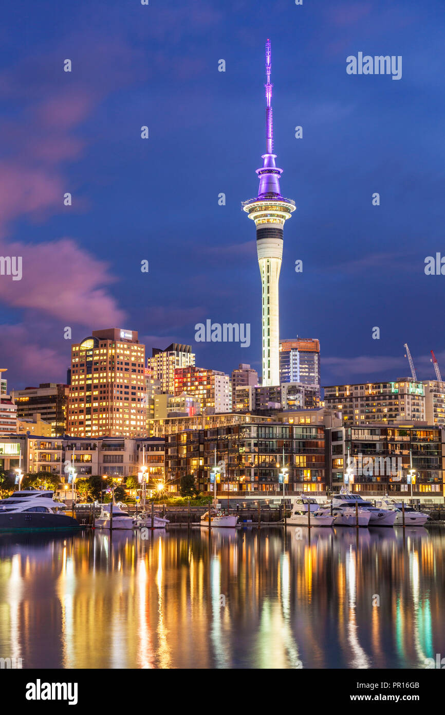 Viaduct Harbour waterfront area and Auckland Marina at night, Auckland skyline, Sky Tower, Auckland, North Island, New Zealand, Pacific Stock Photo
