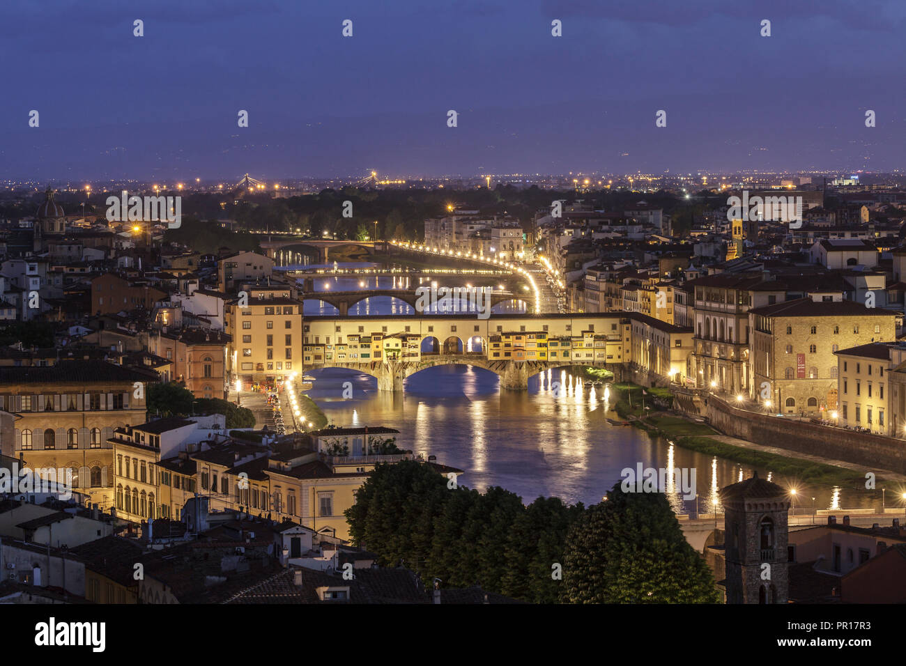 The River Arno and Ponte Vecchio at dusk, UNESCO World Heritage Site, Florence, Tuscany, Italy, Europe Stock Photo