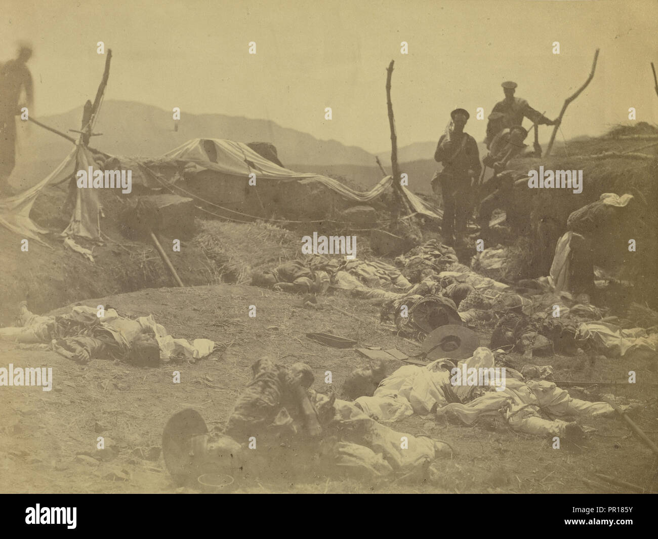 After capture of 2nd Fort Corea - view of dead Coreans. Lt. McKee of Kentucky mortally wounded near this spot; Felice Beato Stock Photo