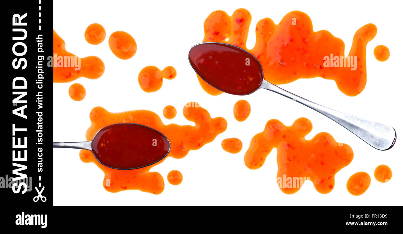 Sweet and sour sauce. Splashes and spilled orange sauce with spoon isolated on white background