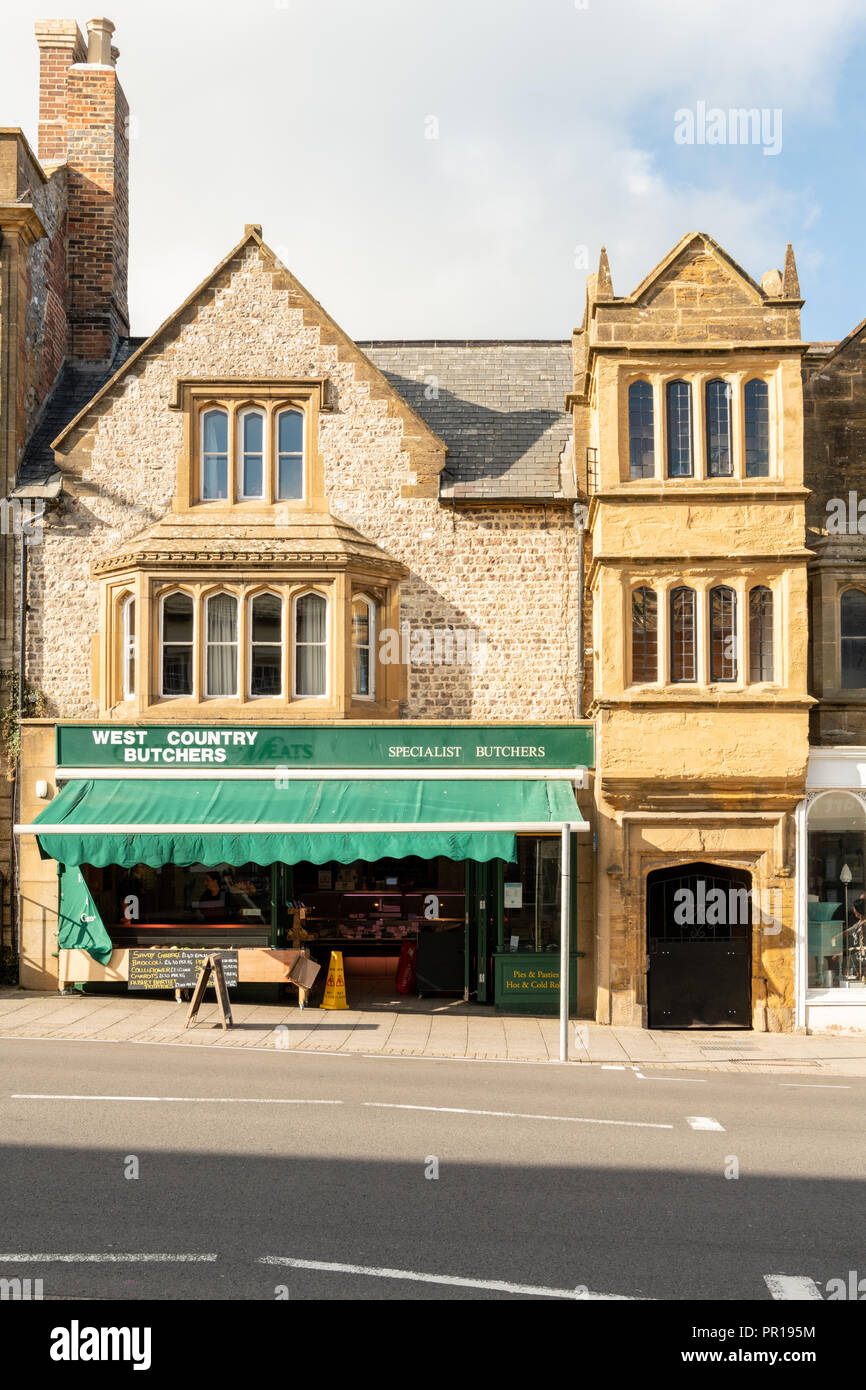 The west Country Butchers shop and other shops in old buildings in the