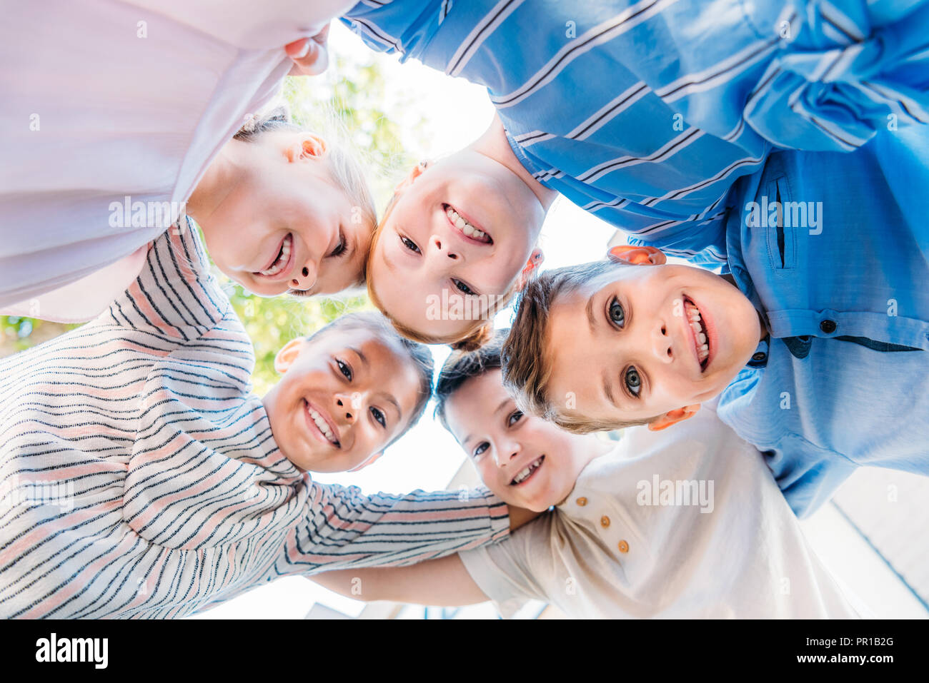 Group of elementary age schoolchildren hi-res stock photography and ...