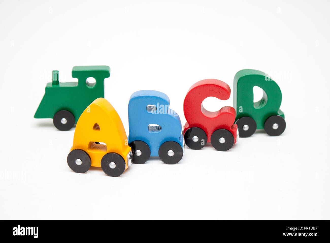 Letters A, B, C, D of a train alphabet with locomotive. Bright colors ...