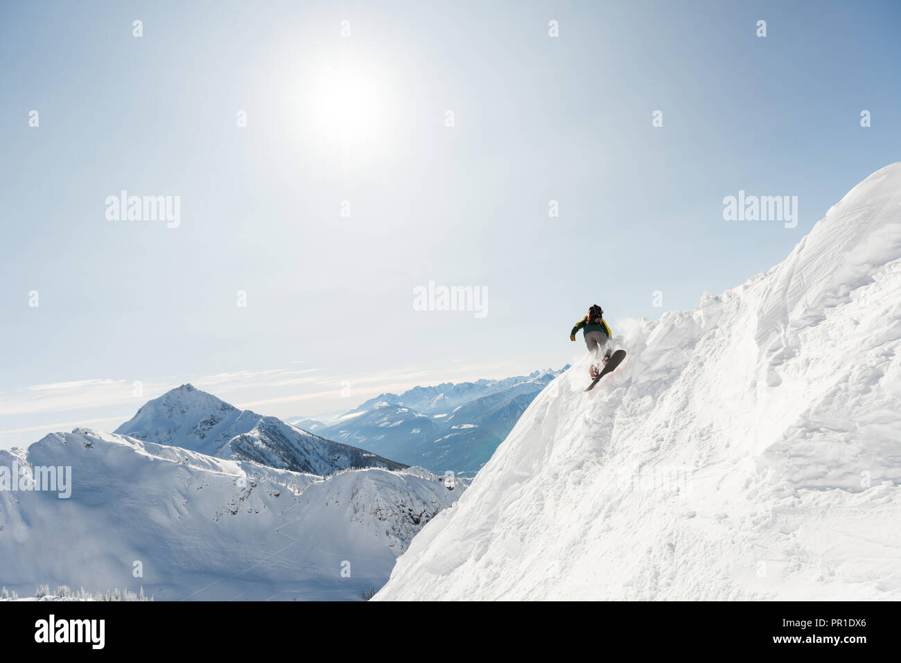 Skier skiing on a snowy mountain Stock Photo