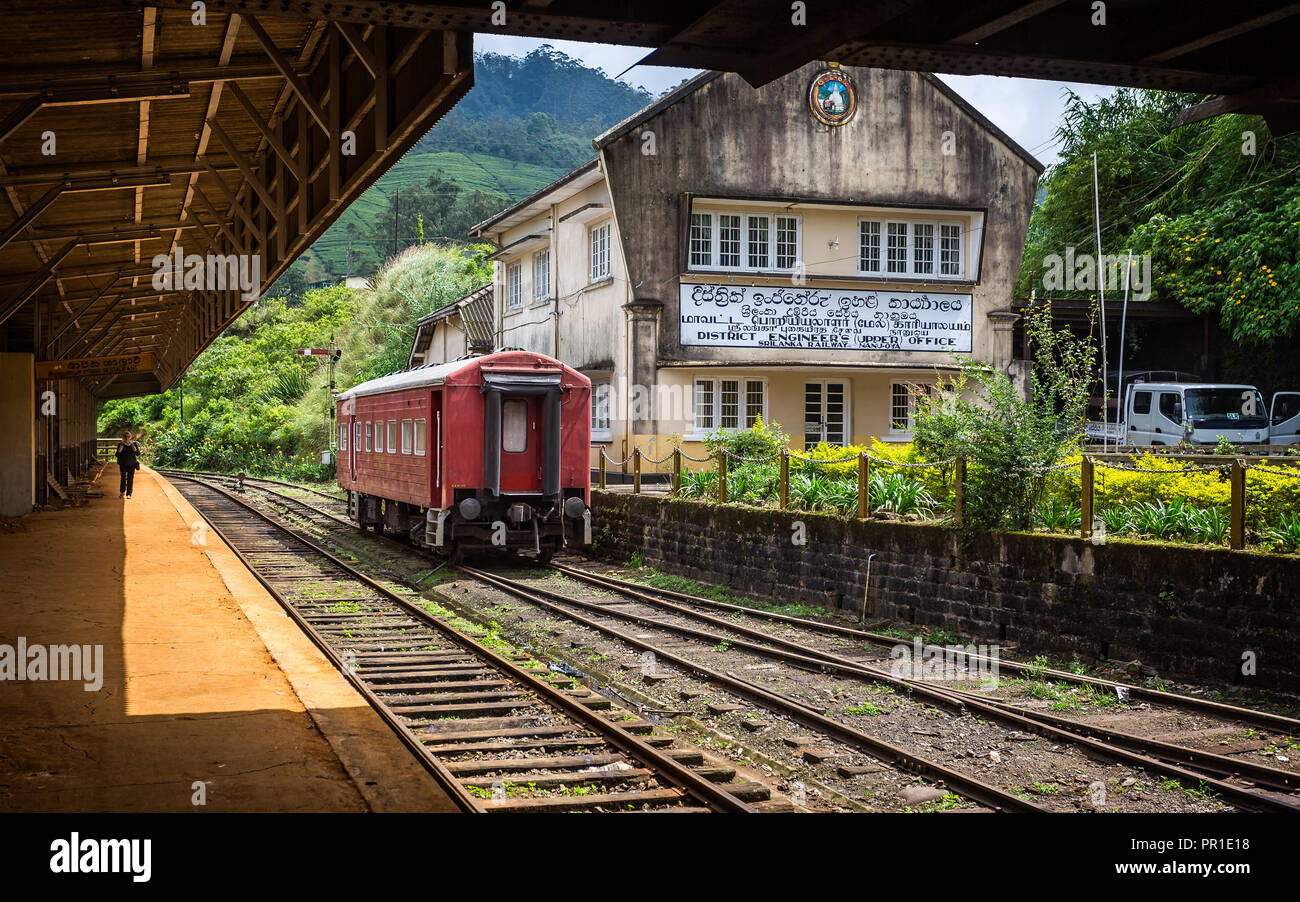 single red train carriage waiting at Nanu Oya station in Sri Lanka on 24 September 2016 Stock Photo