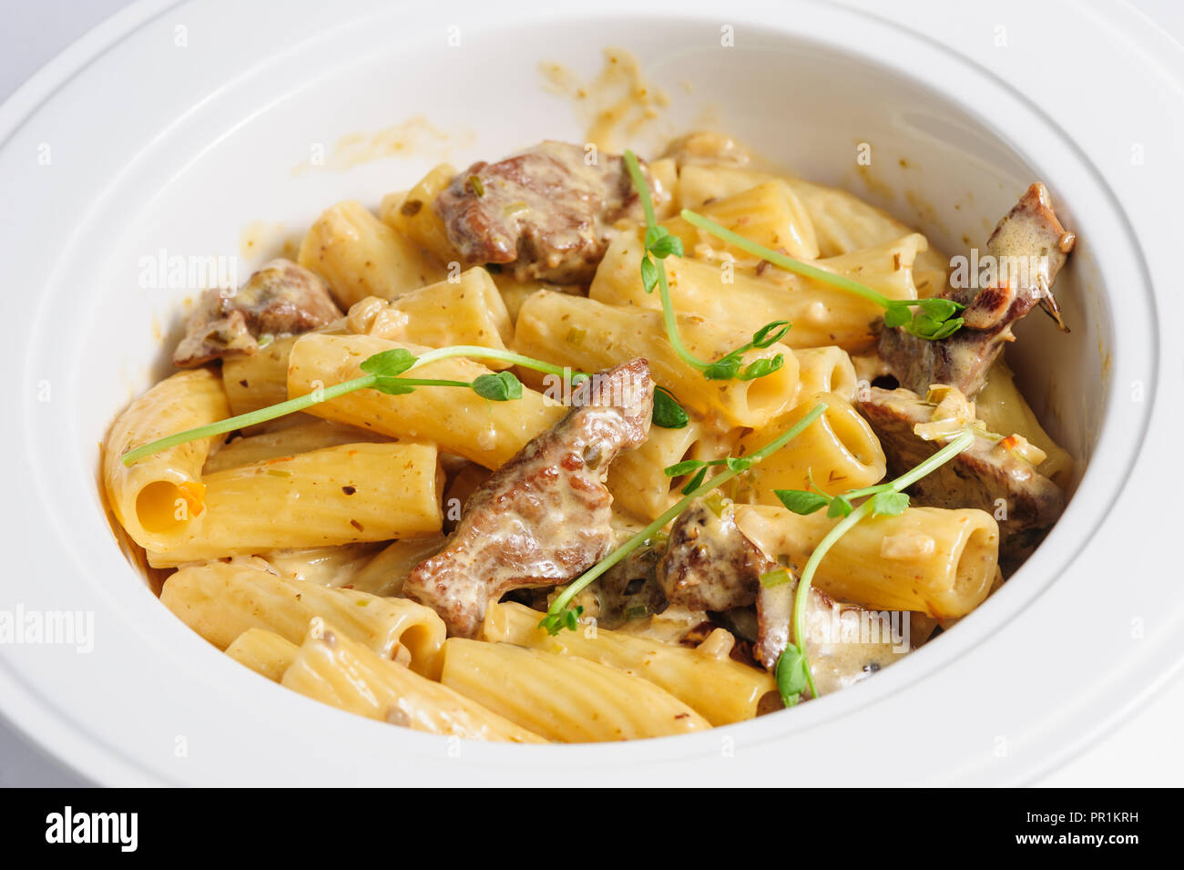 penne pasta with veal meat Stock Photo Alamy