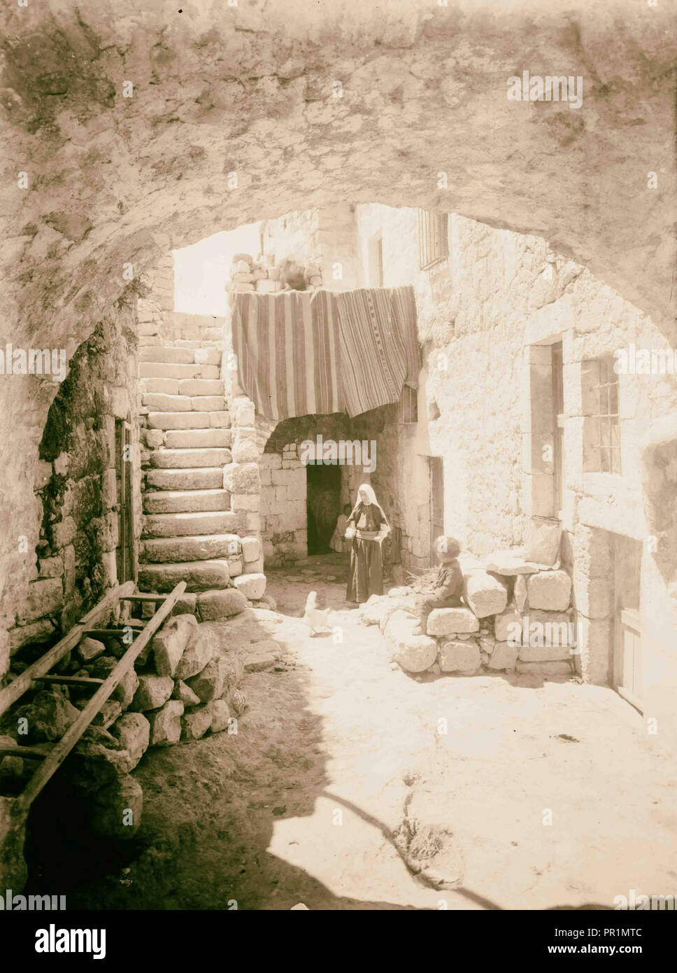 Courtyard of an old house. (In oldest Bethlehem). 1898, West Bank, Bethlehem, Israel Stock Photo