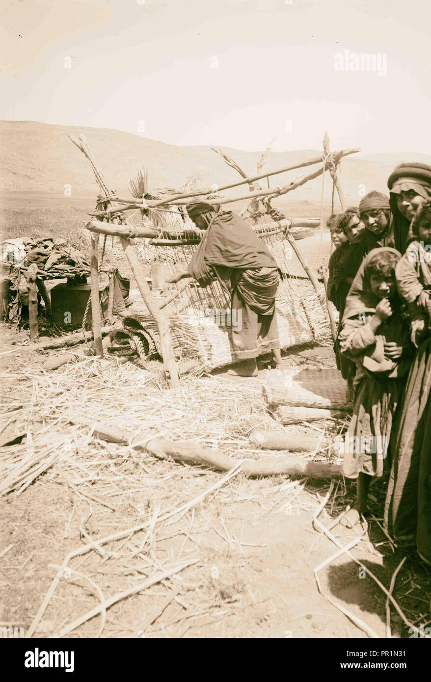 Bedouin woman weaving papyrus mats. 1900 Stock Photo
