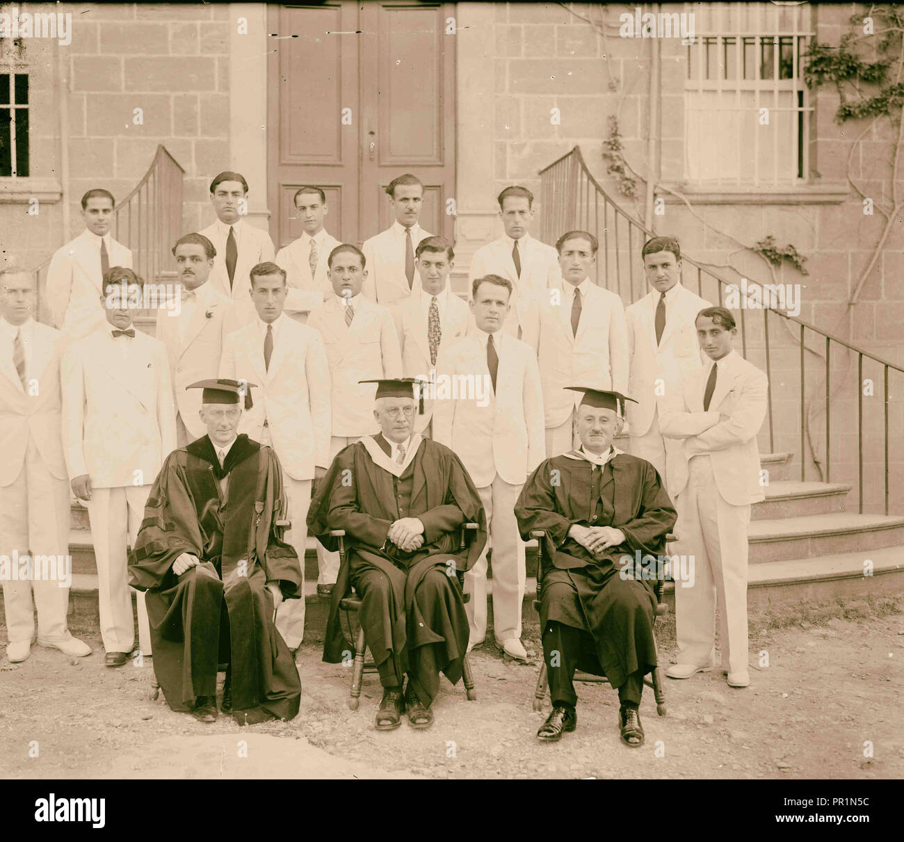 Group portrait of professors and students in front of building. 1910, Middle East, Israel and/or Palestine Stock Photo