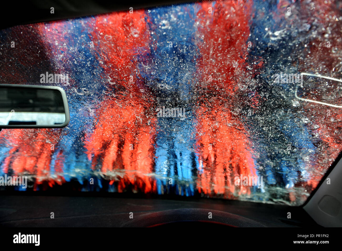 VW Polo going through a car wash on the Old Kent Road, London Stock