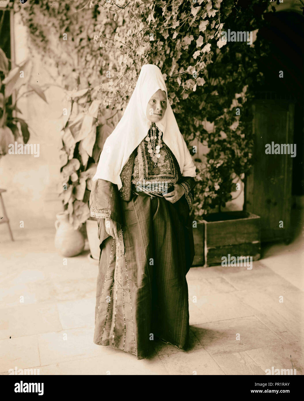 Woman wearing dowry necklace. 1898 Stock Photo