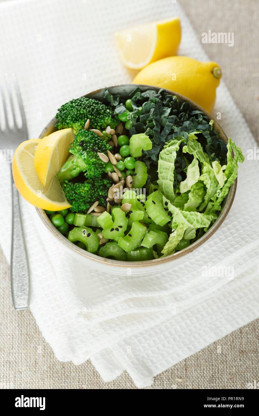 Various green vegetables in a bowl. Stock Photo
