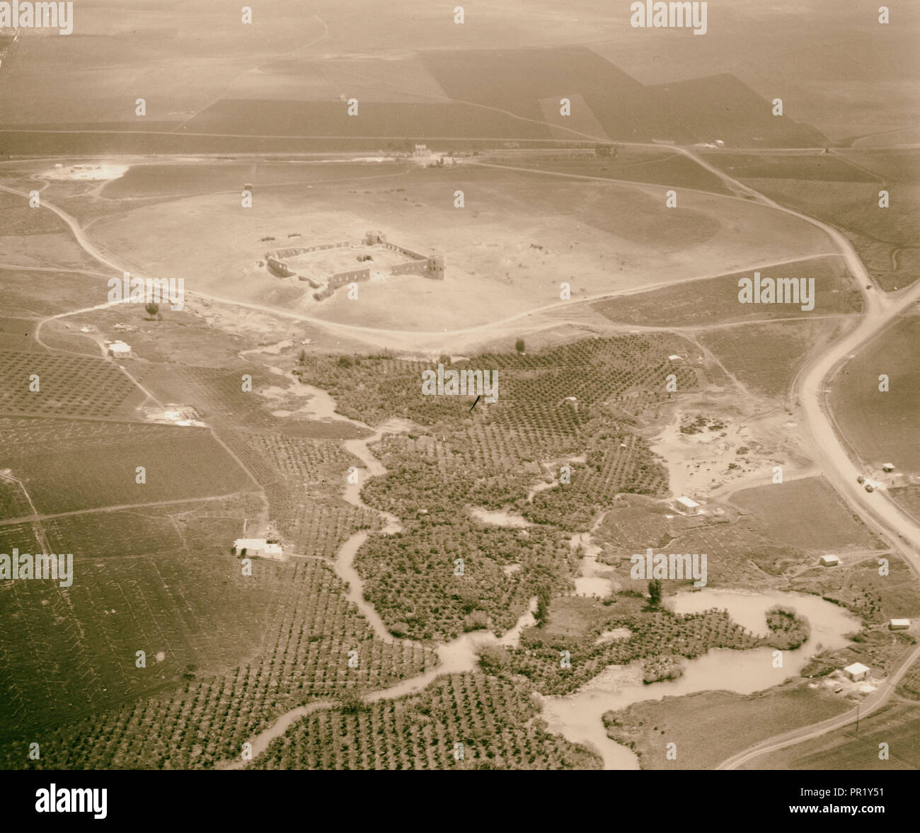 Air view of Aphek, also known as Antipatris, caravansary where Paul stopped. 1925, Caravansaries, Israel, Antipatris Stock Photo