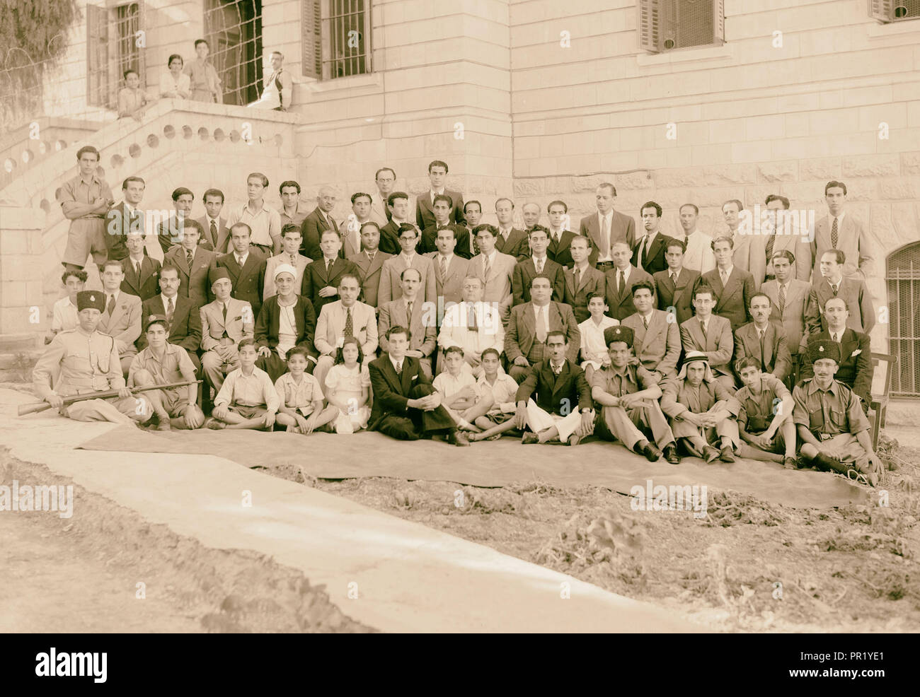P.B.S groups taken on Aug. 8, 1942 (Arabs & Jews), large mixed group. 1942, Jerusalem, Israel Stock Photo
