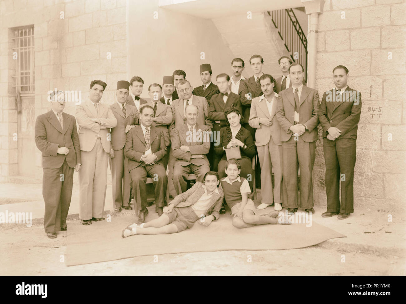 P.B.S. [i.e., Palestine Broadcasting Service] and P.J[?].O. groups, Mr. Tweedy's farewell groups. Group at Arab section of P.B.S Stock Photo