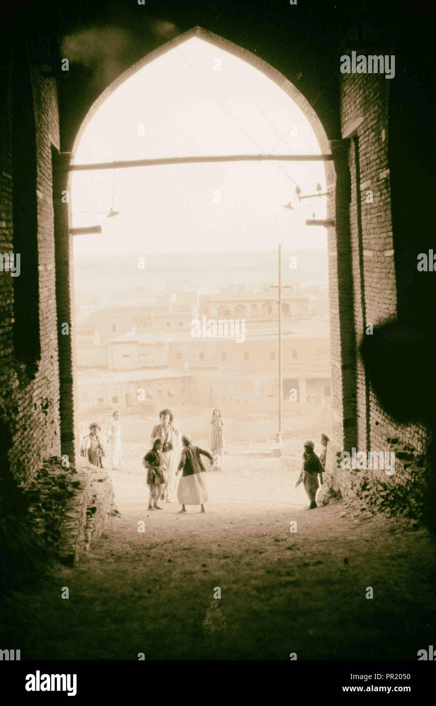 Iraq. Arbela. (Erbil). Center of Ishtar cult in Assyrian period, 2200 B.C. View looking out through the city gate. 1932, Iraq Stock Photo