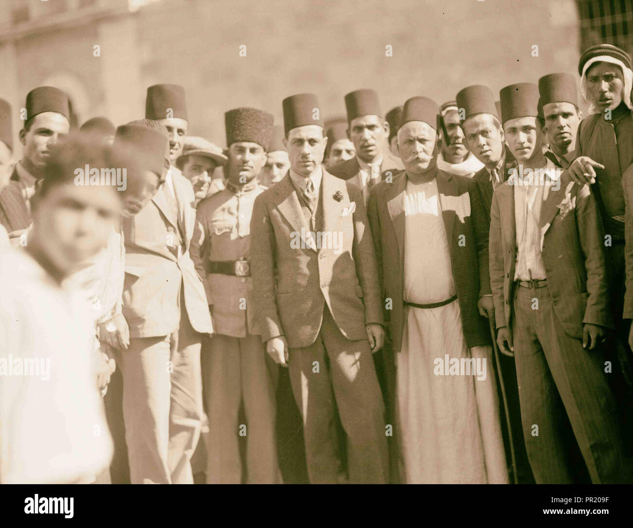 Group taken near post office after new gate police charge with Fakhir Nashashibi. 1933, Jerusalem, Israel Stock Photo