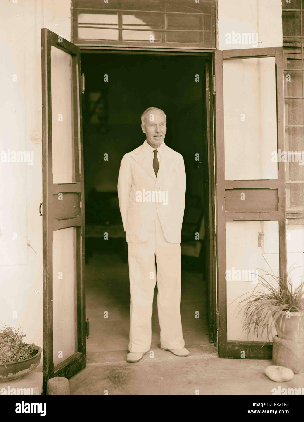 Dr. H. Torrance, Tiberias. Mr. Radford in doorway of doctor's house. 1940, Israel, Tiberias Stock Photo