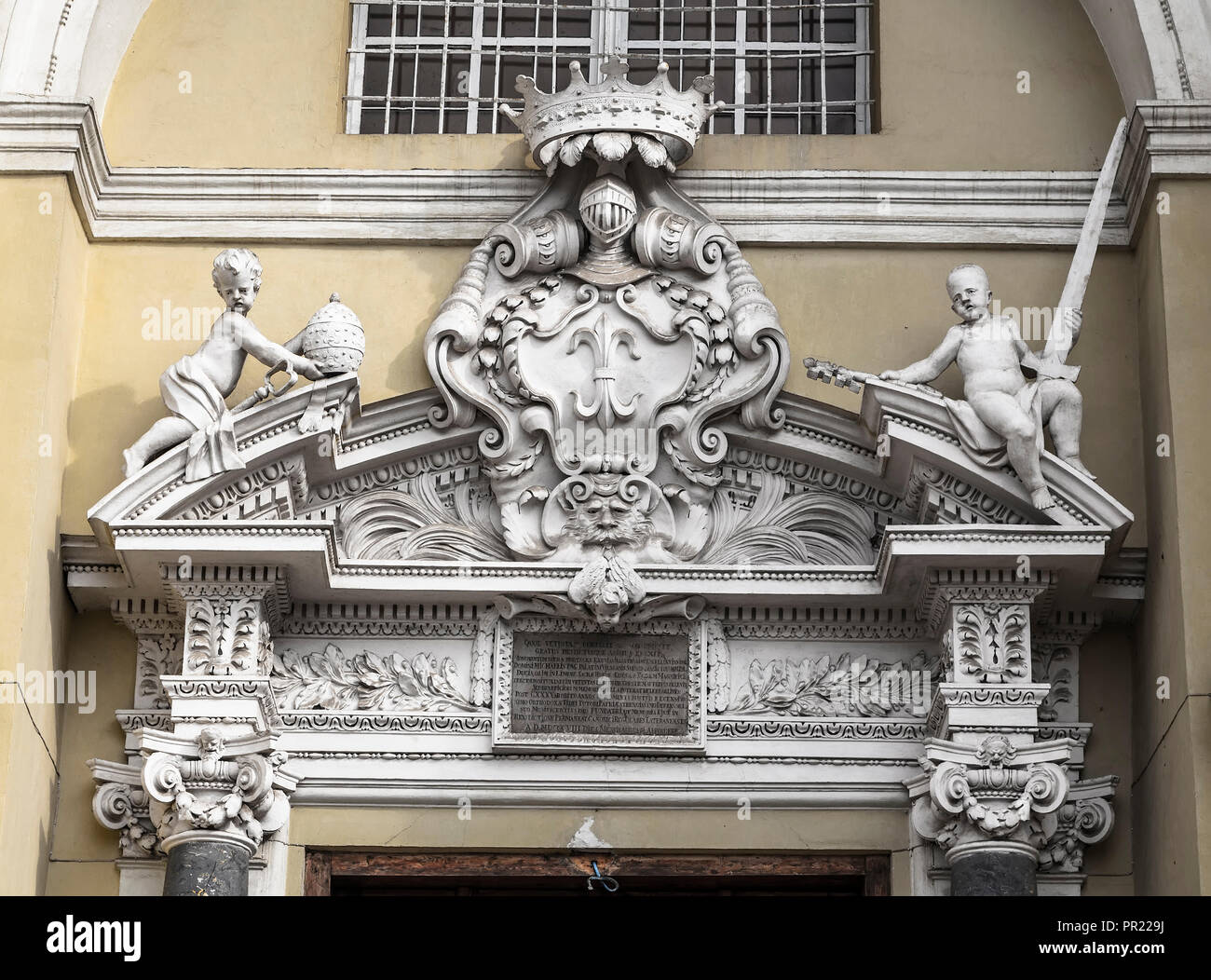 Execution the portal above the entrance to the Church of Saints Peter and Paul in Vilnius. Lithuania Stock Photo