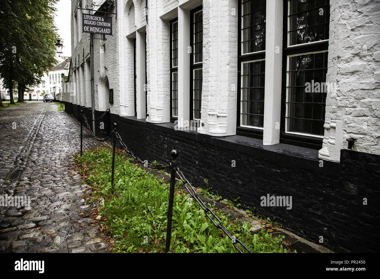 Begijnhof, typical and old district of Bruges, detail of typical Belgian house, tourism in Europe Stock Photo