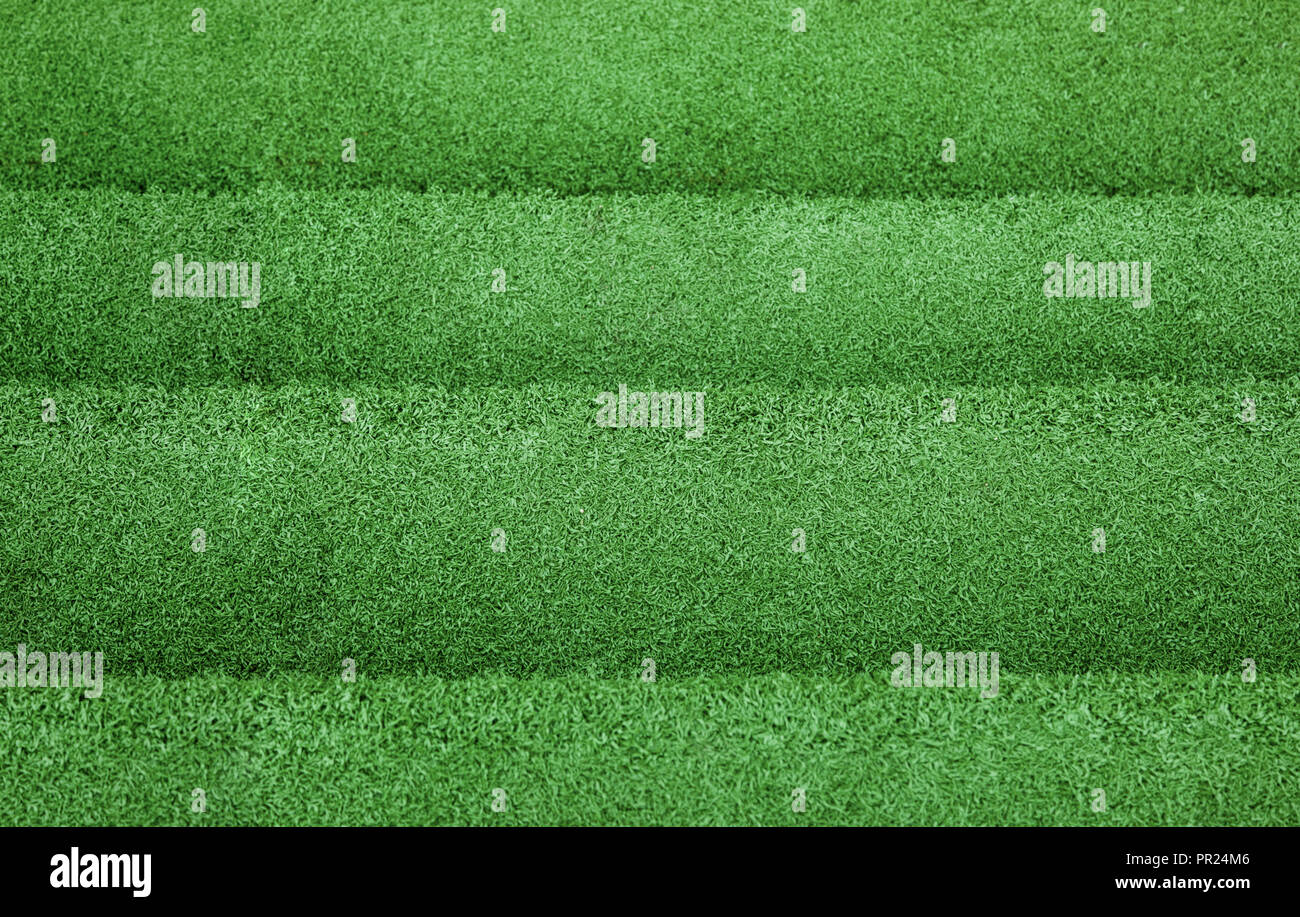 Green artificial grass texture background Stock Photo - Alamy