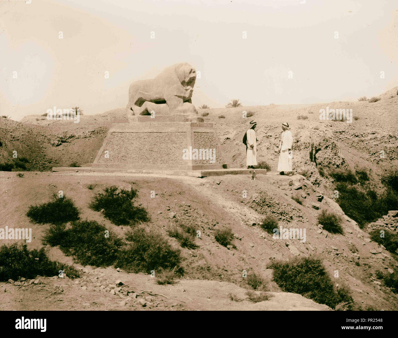 Iraq. Babylon. Basalt lion with figures. 1932, Iraq, Babylon, Extinct city Stock Photo