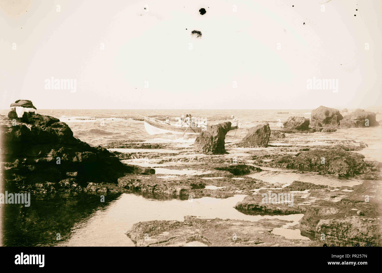 Jaffa (Joppa) and environs. Boat going through the rocks. 1898, Israel ...