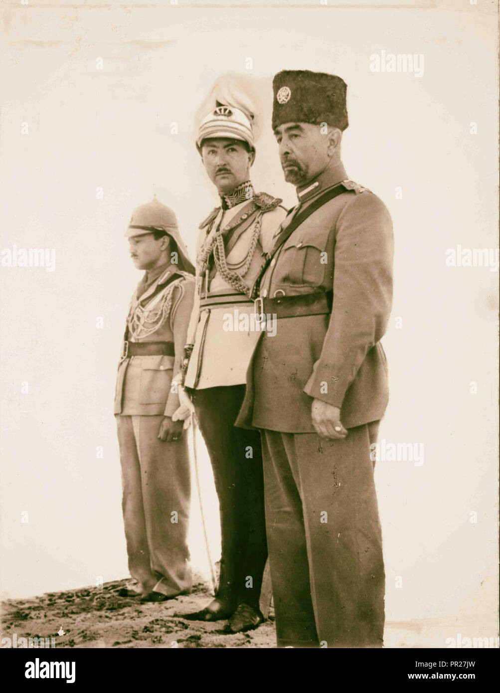 Coronation' of King Abdullah in Amman. (right to left) King Abdullah, Emir Abdul Illah (Regent of Iraq), and Emir Naif Stock Photo