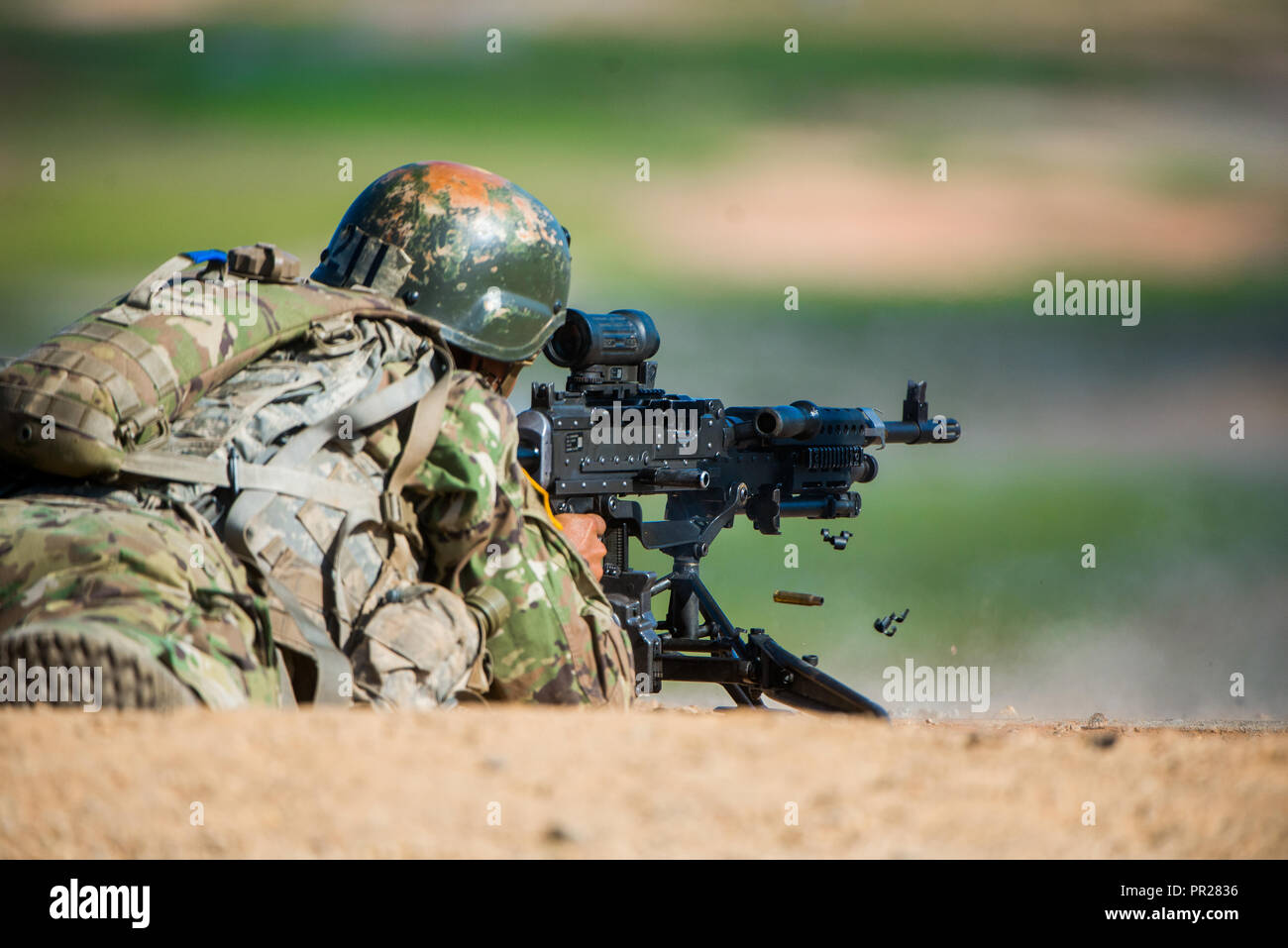 FORT BENNING, Ga. (Sept. 21, 2018) – As part of changing one-station unit training (OSUT) for Infantry Soldiers from 14 to 22 weeks, trainees received instruction on the M240-series medium machine gun Sept. 21 at Malone Range Complex at Fort Benning, Georgia. Changes to OSUT are meant to increase Soldier readiness, making them more lethal and proficient before they are assigned to their first duty stations as Infantry Soldiers. Before OSUT transformation, the Soldiers received M240 instruction after completing OSUT. (U.S. Army photo by Patrick Albright, Maneuver Center of Excellence, Fort Benn Stock Photo