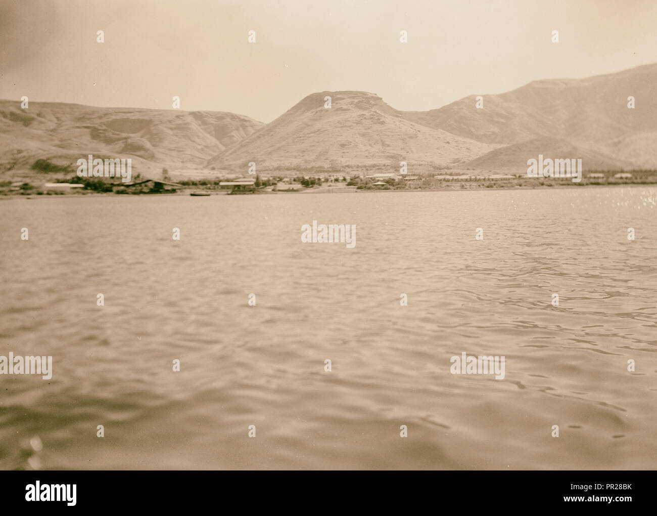 Ain Geb from the sea. 1945, Lakes & ponds, Hills, Israel Stock Photo