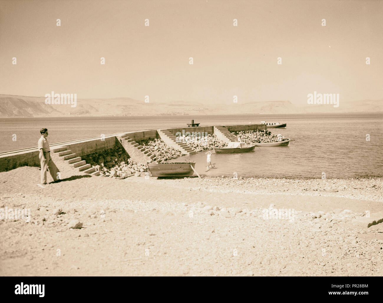 Ain Geb, the pier. 1945, Rowboats, Piers & wharves, Israel Stock Photo